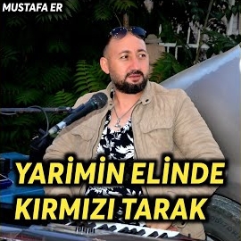 Yarimin Elinde Kırmızı Tarak