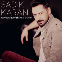 Radyoda Geçtiğin Şarkı Gibiyim